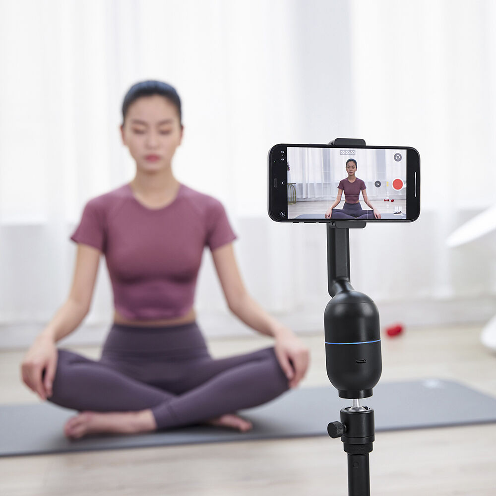 2a105d252e5a9ada16e40ec2c7f3bc79.jpeg OBSBOT Me AI-Powered Selfie Smartphone Mount | 120° Wide-Angle Sensing Camera | Automatically Pans to Keep You in Frame