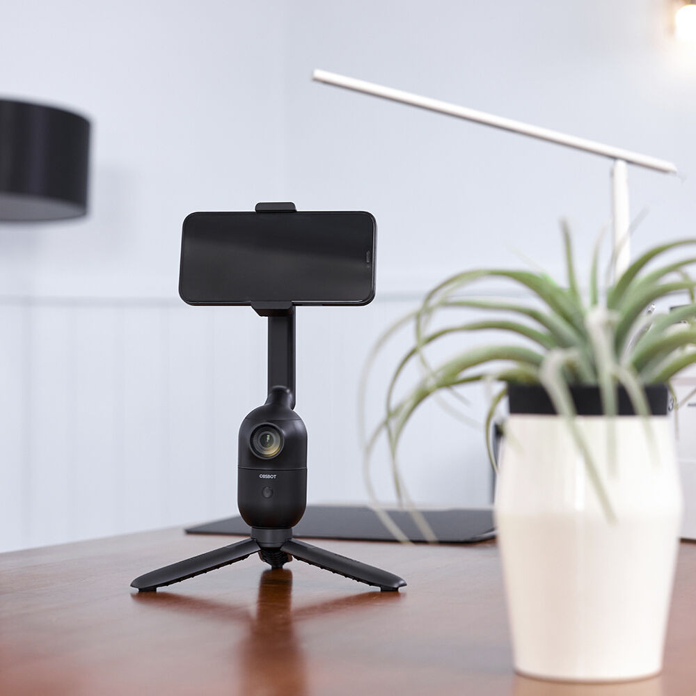 6903629f16286aacec53e4f1df80db64.jpeg OBSBOT Me AI-Powered Selfie Smartphone Mount | 120° Wide-Angle Sensing Camera | Automatically Pans to Keep You in Frame
