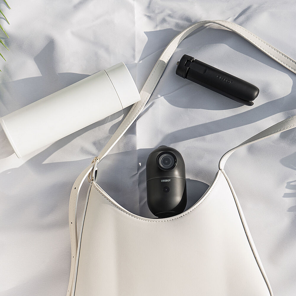 b9405e102309e34698c3bb013682874d.jpeg OBSBOT Me AI-Powered Selfie Smartphone Mount | 120° Wide-Angle Sensing Camera | Automatically Pans to Keep You in Frame
