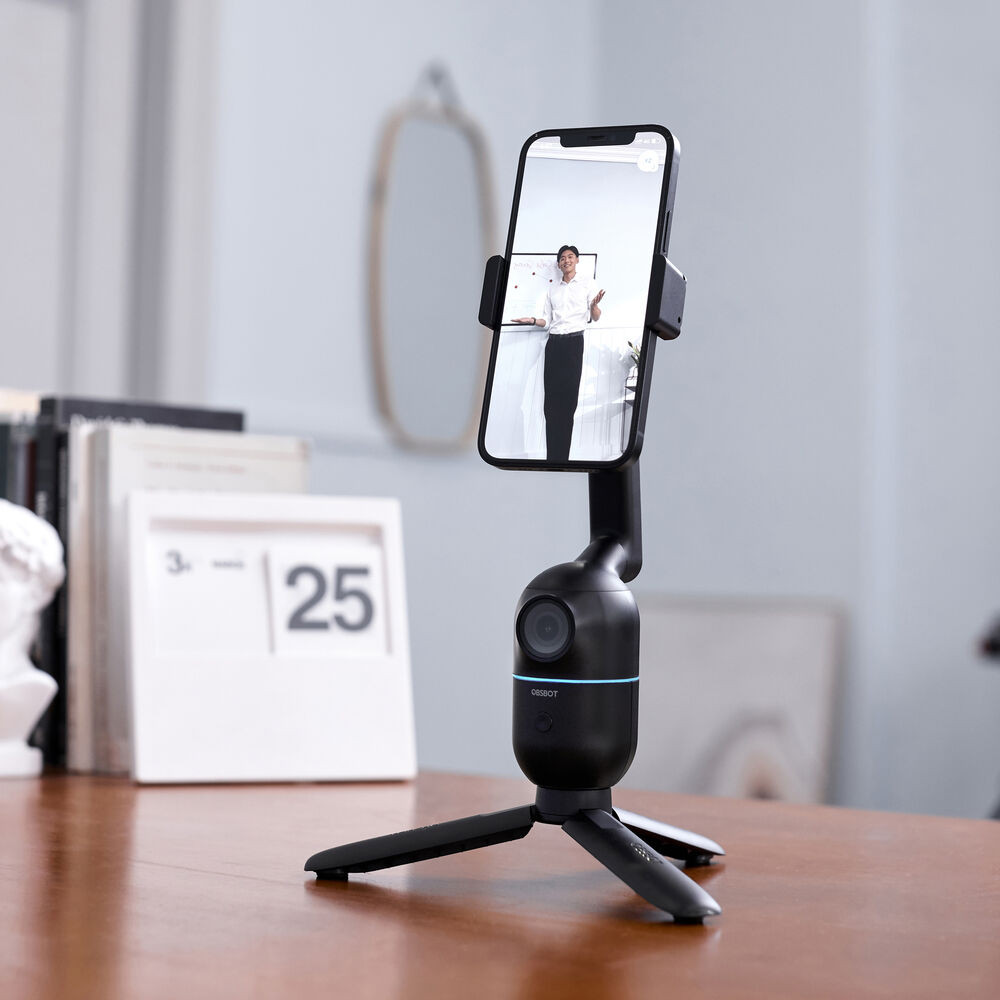 c3d971a0efd792d384359bca3682709f.jpeg OBSBOT Me AI-Powered Selfie Smartphone Mount | 120° Wide-Angle Sensing Camera | Automatically Pans to Keep You in Frame